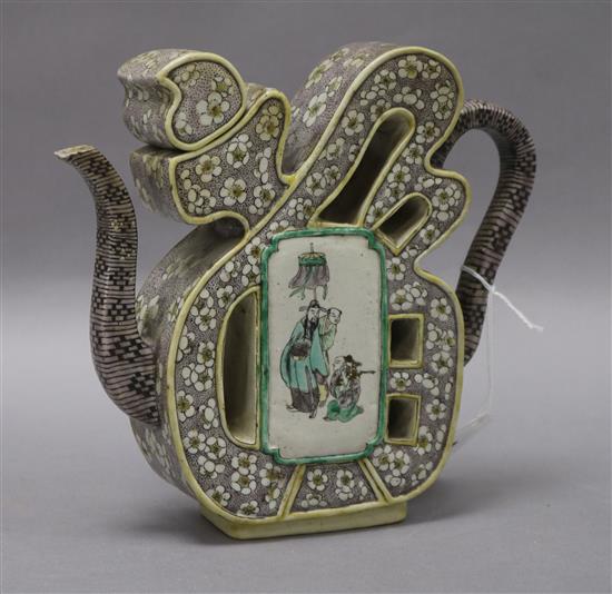 A 19th century Chinese enamelled biscuit Fu wine pot and cover, repaired